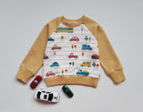 Džemperis su mašinėlėmis ir autobusais